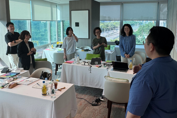 Laughing and smiling participants of the Team Management Profile (TMP) Accreditation Workshop in Seoul Korea